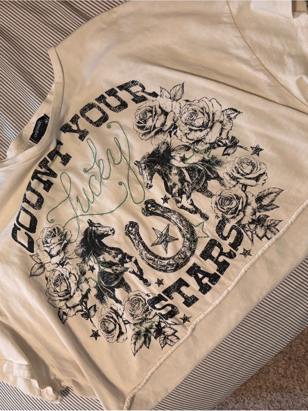 Buckle Cream Crop Top with Black Western Graphic and Green Script